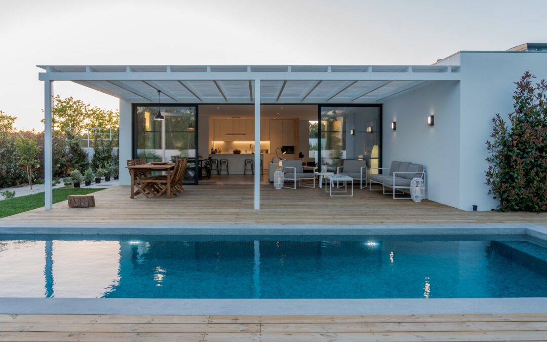 Modern pool house backyard design