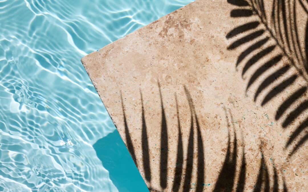 Poolside edge with palm trees